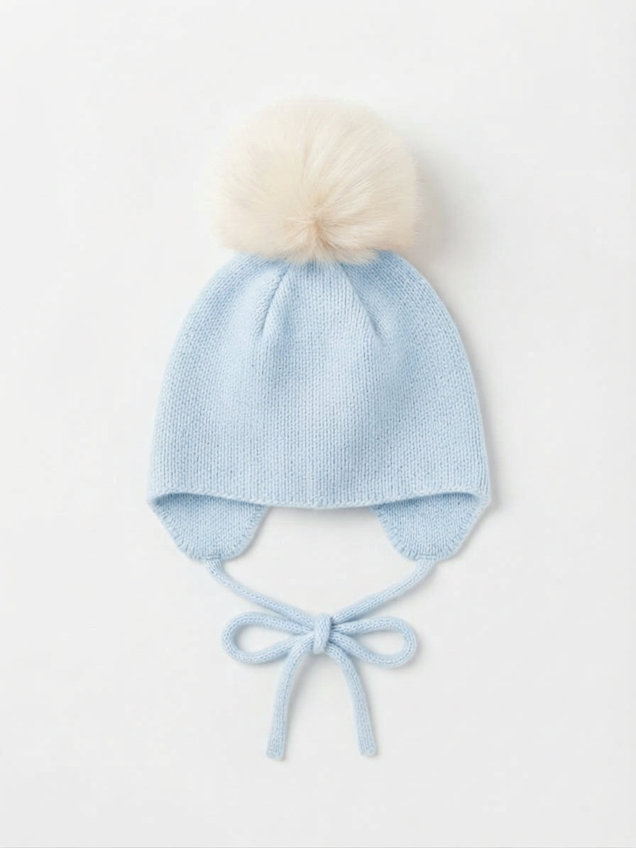 BERRETTO CON POMPON E PARAORECCHIE IN LANA J.O MILANO