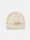 CAPPELLINO IN MAGLIA CON FIOCCO LATERALE LES JOIES