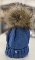 CAPPELLO IN TESSUTO CON POMPON MOURMANSKI