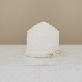 CAPPELLINO IN CALDO COTONE CON FIOCCO E FIORELLINO NINNAOH