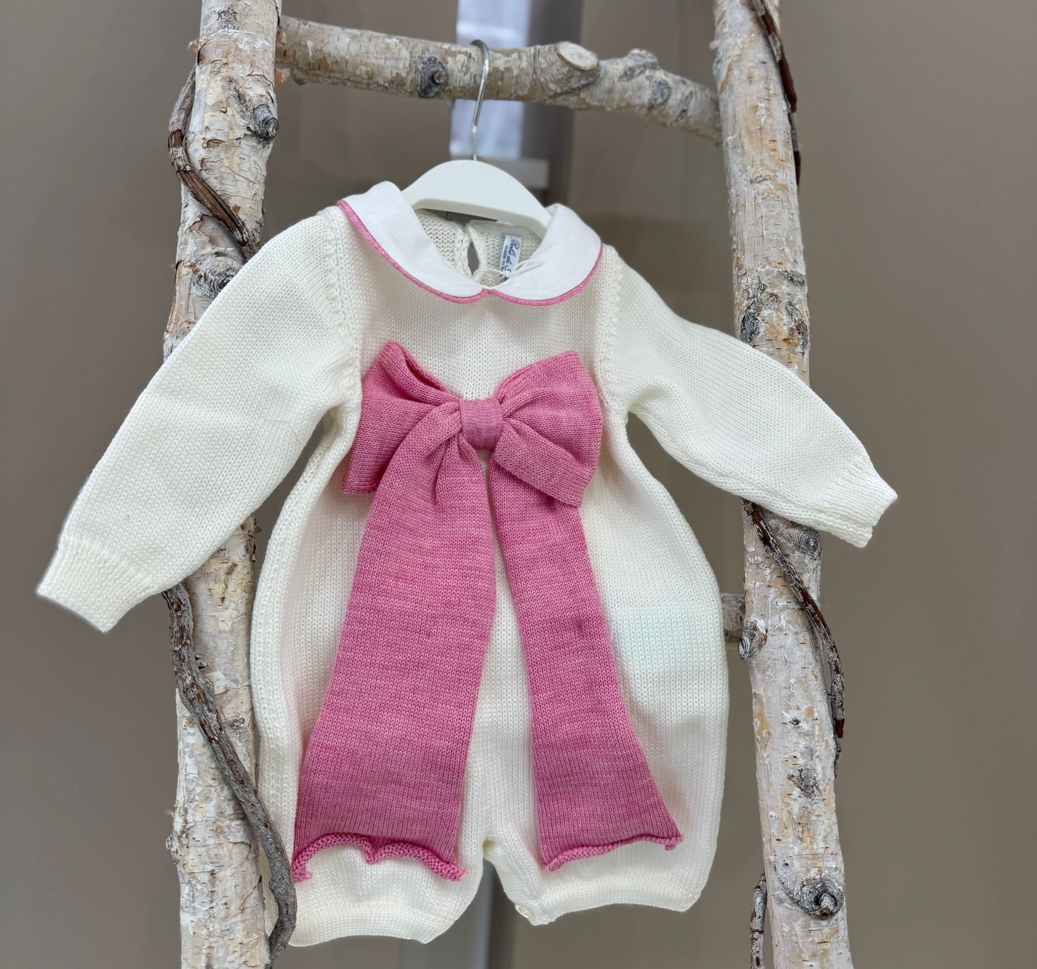 PAGLIACCETTO IN MAGLIA CON FIOCCO BEBE' DI ALMY
