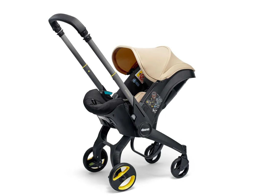 SEGGIOLINO AUTO E PASSEGGINO DOONA I I-SIZE