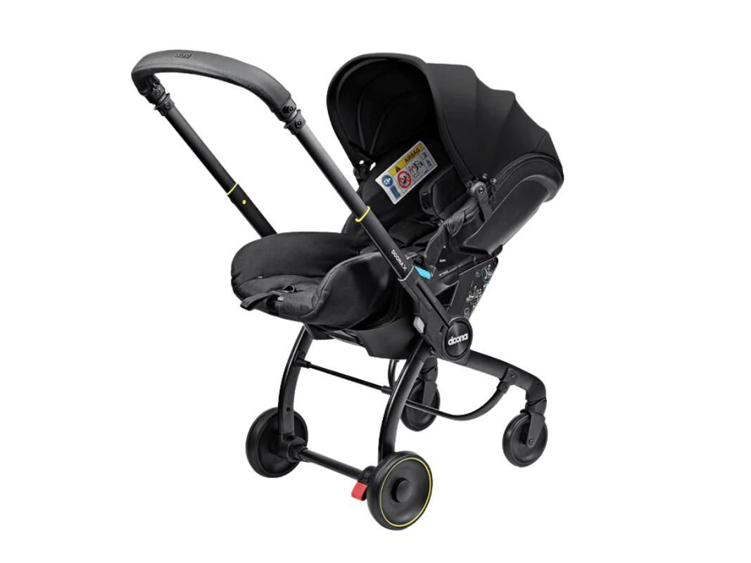 SEGGIOLINO AUTO E PASSEGGINO RECLINABILE DOONA X