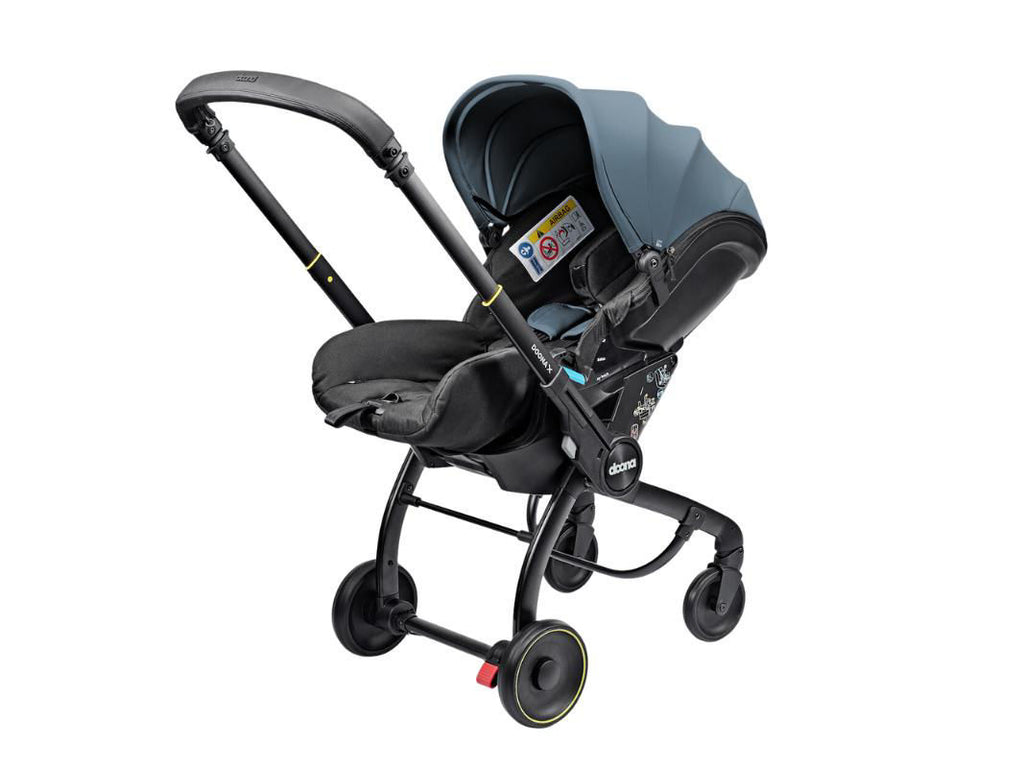 SEGGIOLINO AUTO E PASSEGGINO RECLINABILE DOONA X